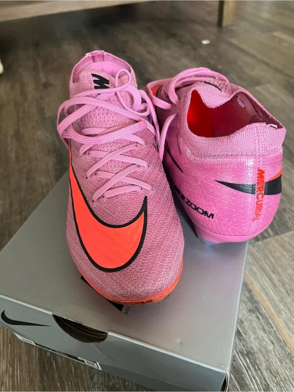 Nike Pink and Orange Men's Mercurial Athletic Cleats with matching bag